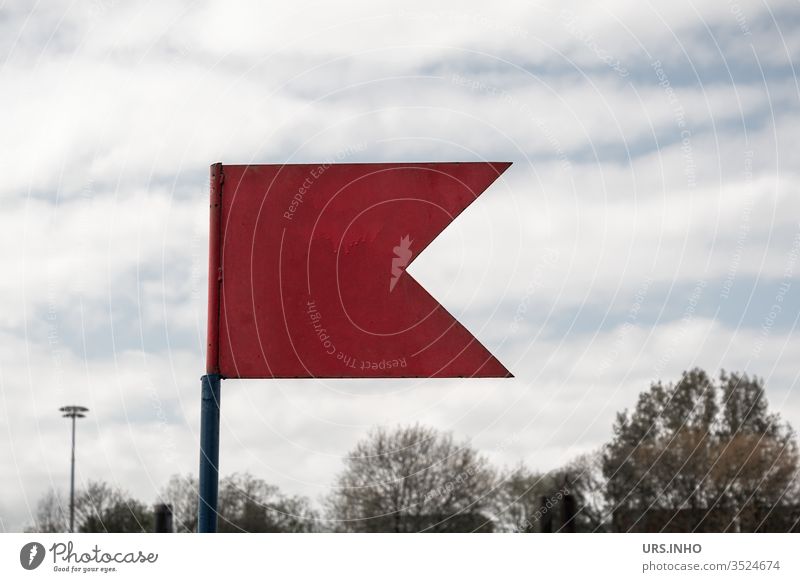 red metal flag in front of tree crowns Flag Metal flags Red cloudy Sky Day white clouds Treetops Blow Signal esteem