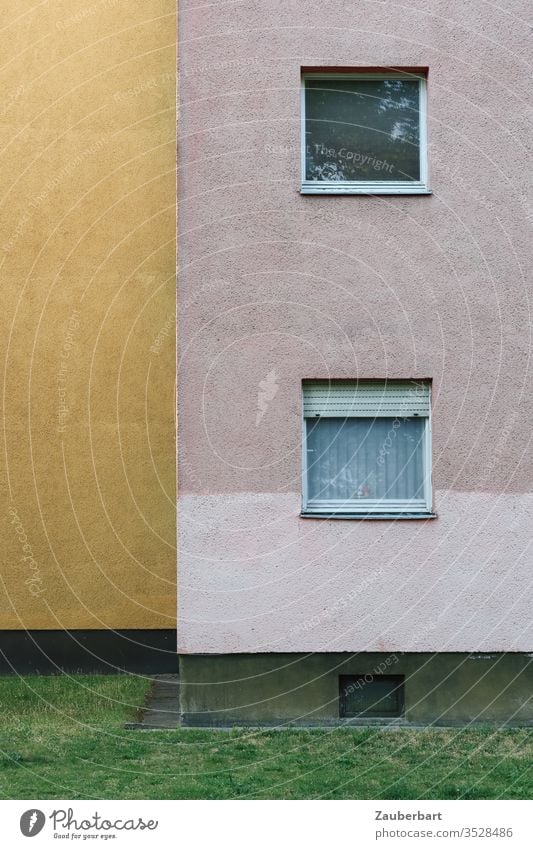 Façade and two windows of a residential house of the 60s, ochre yellow and pink in geometric representation Facade Window 1960s Apartment Building Curtain