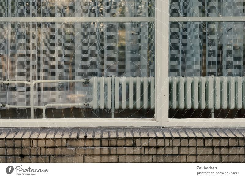 Window with white frame, behind it radiator and curtain, on heel of light bricks Frame White Heater Heating pipes Curtain Facade Manmade structures