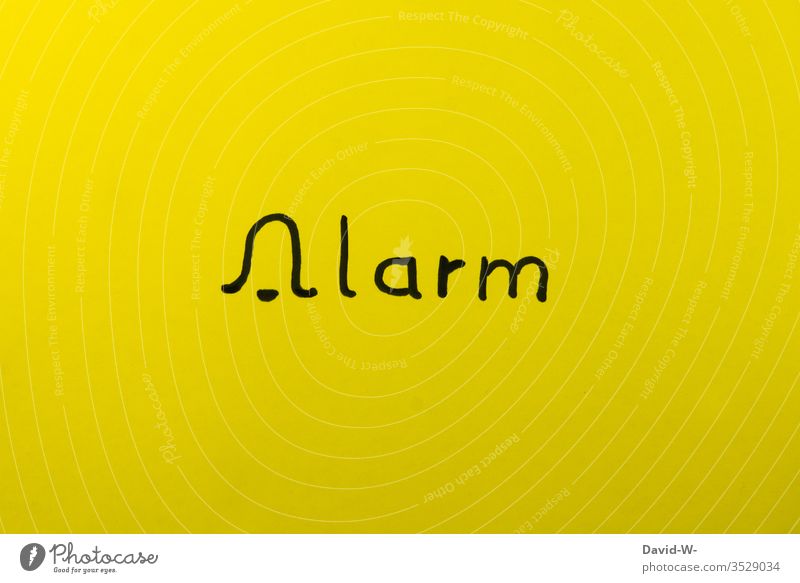 Word play - Alarm - drawing of a bell with yellow background Alarm system alarm bell Drawing Bell esteem Colour photo Caution Precuation Exterior shot Wordplay