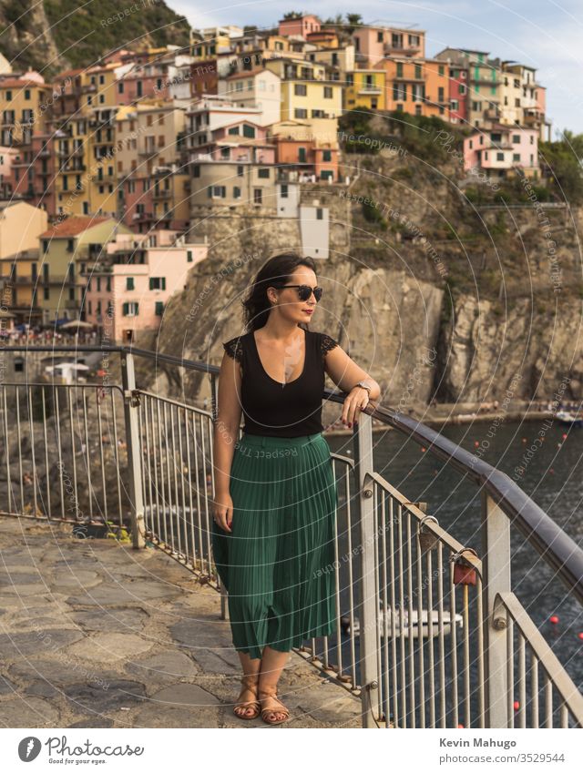Beautiful woman viewing sunset in Italy stone italy houses colors breathing travel young girl style people wall local person female lifestyle cute beautiful