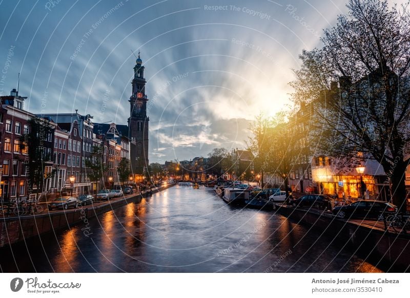 view of an Amsterdam canal in the district of Joordan with The Church of the West amsterdam architectural architecture bell city cityscape clock detail europe