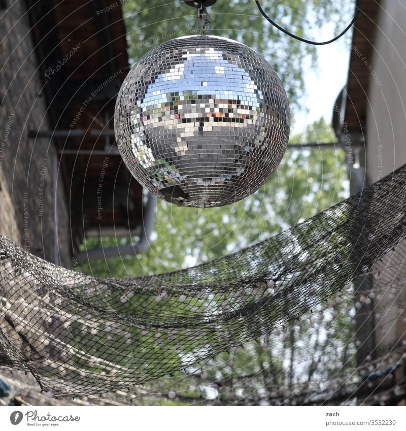 disco ball hangs in the garden Party Disco Disco ball Disc jockey Party night Outdoor festival Club Feasts & Celebrations Music Lifestyle Dance Light Night life