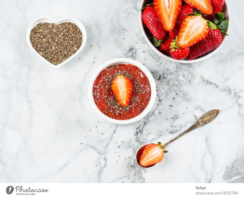 Strawberry chia jam made with chia seeds strawberry low sugar detox sweet dessert food healthy homemade jar summer red fruit jelly marble organic ingredient