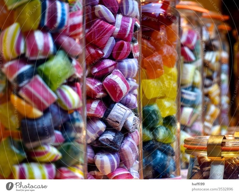 Coloured sweets in jars Candy Sweets Sugar Nutrition Addiction narcotic Red Multicoloured nib sweets and biscuits Toothache Yellow green Dentist Muddled Sticky