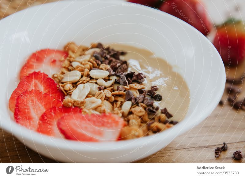 Sweet puree with strawberry served and nuts with chocolate sweet breakfast bowl walnut peanut healthy fruit morning table tasty delicious dessert food fresh