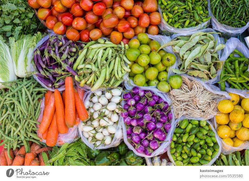Colorful fresh fruits and vegetable market food marketplace farm tomatoes vegetarian cucumbers beans variation basket stand background grocery cuisine various