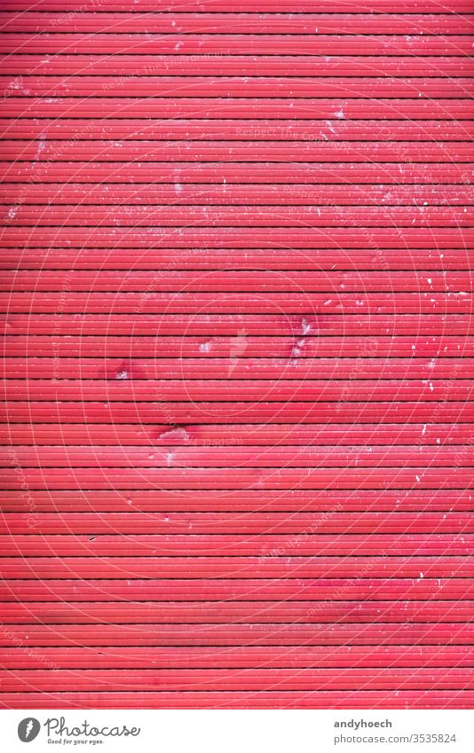 A old closed broken red roller shutter abandoned abstract blind backdrop Background backgrounds blinds building built structure color construction copy damage