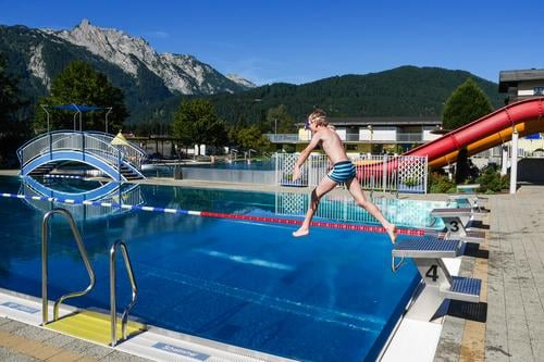 Outdoor pool in the mountains Alps vacation Vacation mood Open-air swimming pool Swimming pool Vacation & Travel Swimming & Bathing Exterior shot Water Summer