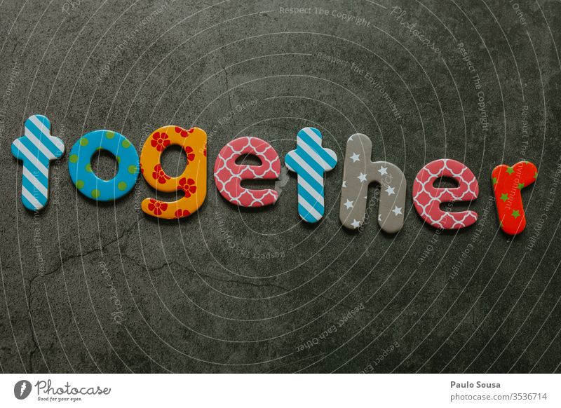 Together word togetherness message Word Copy Space background Colour photo Deserted Characters Neutral Background Communicate Emotions Isolated Image