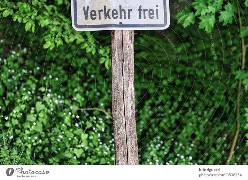 Those who think ambiguously clearly have more to laugh about. Sign (section) of a signpost for the use of the road by forestry and agriculture in the forest.