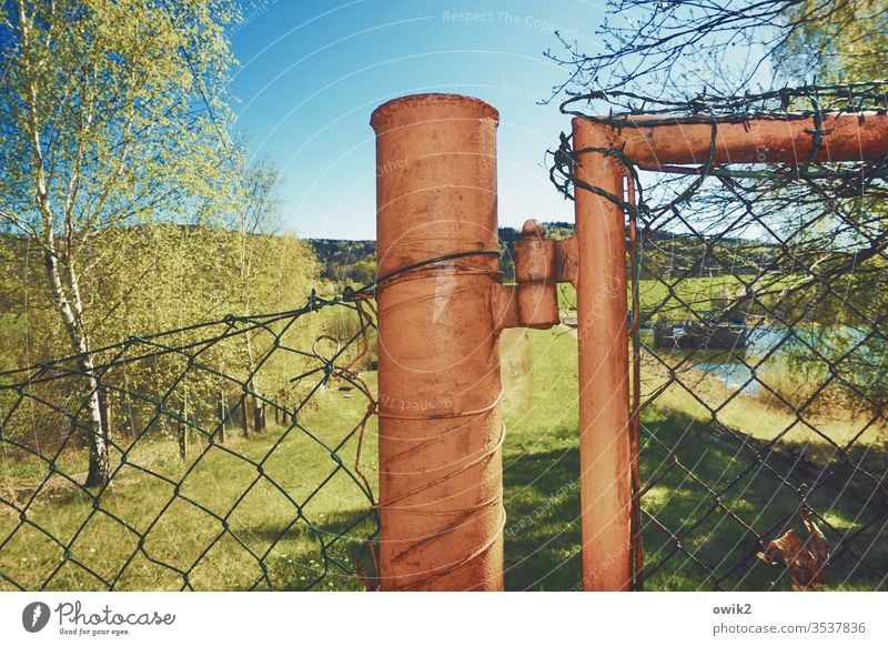 No access Fence Pole Flash photo Metal Wire netting fence Nature Landscape huts Cloudless sky Sunlight Beautiful weather Shadow Grass Light Environment Day Sky