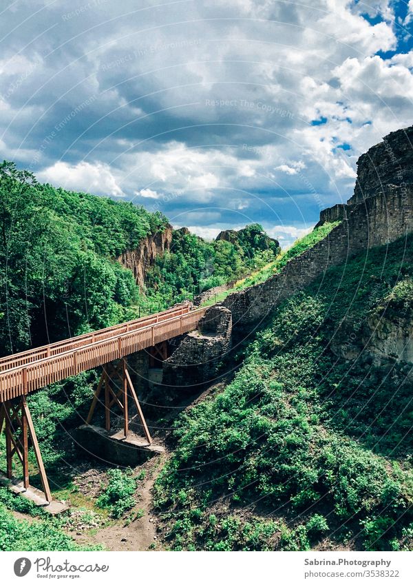 Restored bridge as access to a castle ruin Castle ruin wood Wooden bridge Restoration Baden-Wuerttemberg Germany somber Summer Summer's day Hiking explore