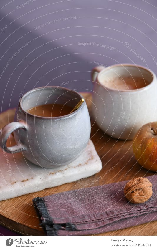 Two cups of Chaï tea on a wooden board spoon daylight Café Caffeine brewed coffee Aromatic Close-up Beverage Coffee cup Hot drink To have a coffee Cup Drinking