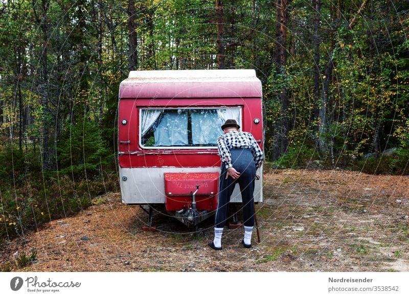 Oops ... or the cliché of the camper Man Camper Sweatpants Caravan Camping Camping site Strange Slapstick comic Stereotype Cliche symbolism mishap Adversity