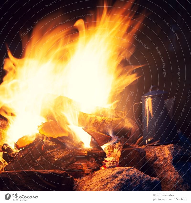 https://www.photocase.com/photos/3538633-campfire-and-coffee-pot-in-the-evening-campfire-photocase-stock-photo-large.jpeg