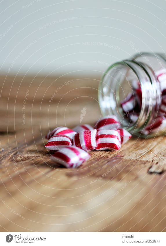 peppermint Food Candy Nutrition Eating Glass Red White Striped Sweet Tasty Wooden table Delicious Calorie Colour photo Interior shot Close-up Detail