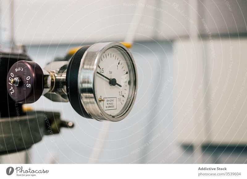 Metal manometer with arrow and clock face pressure gauge medical instrument metal device instrument arrow equipment pressure supply gage tensiometer