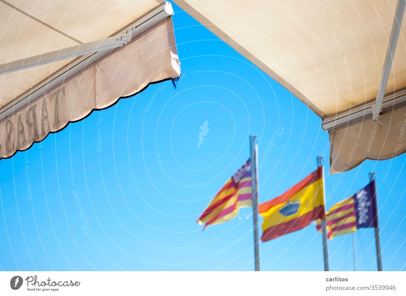 See the flags under the awning with Sangria flag Spain Balearic Islands Vacation & Travel Summer Majorca Mediterranean Warmth Flag Pole Sun blind Tapas bar