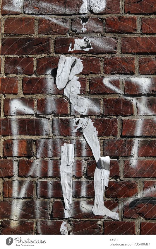 Brick facade with the outline of a figure Wall (barrier) Wall (building) Stone Structures and shapes Red Facade Old Graffiti Art Decline Stencil Human being