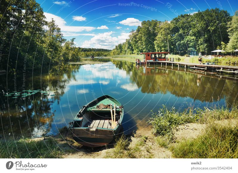 nut shell Lake Mecklenburg-Western Pomerania out Exterior shot Landscape Water Sky Reflection Clouds Mirror Lake Colour photo Nature Deserted Blue