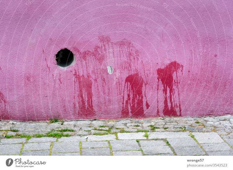 Spots on a pink house wall stains Markings Urinated Urine stains Facade Wall (building) variegated Exterior shot Deserted Colour photo opening Day off Footpath