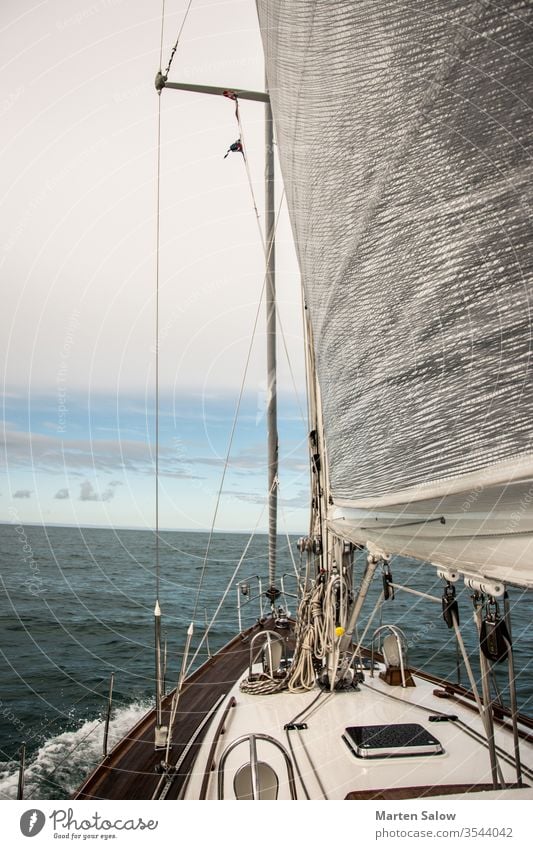 life is better with sails up sky blue white boat ocean sailing sea wind yachting travel water sport sailboat mast genoa sunny adventure deck luxury wave