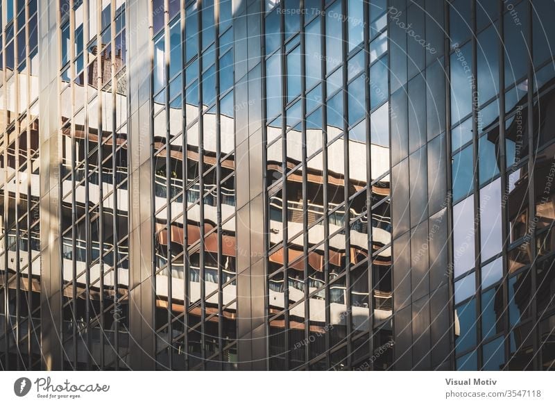 Glass windows of an office building facade architecture architectural architectonic urban metropolitan constructed edifice structure geometric geometrical