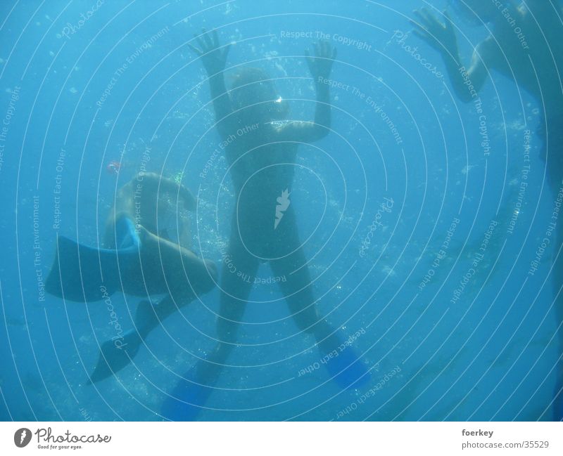 Float from below Ocean Dive Human being Graffiti Water Perspective