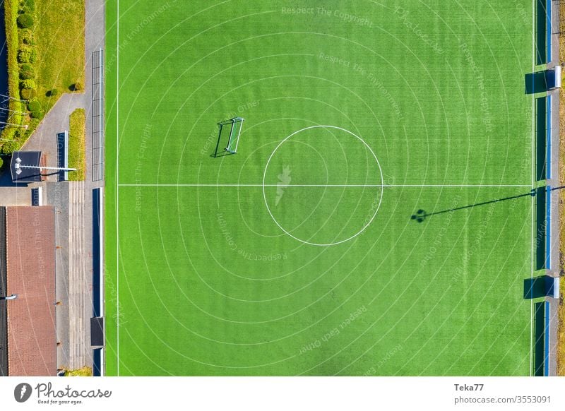 On the football field #1 soccer Sports from on high drone Sporting grounds green Empty Ball sports