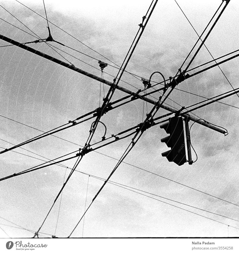 Overhead lines and traffic lights Traffic light Overhead contact lines Analog Black & white photo Sky Town Exterior shot Transport Day traffic guidance system
