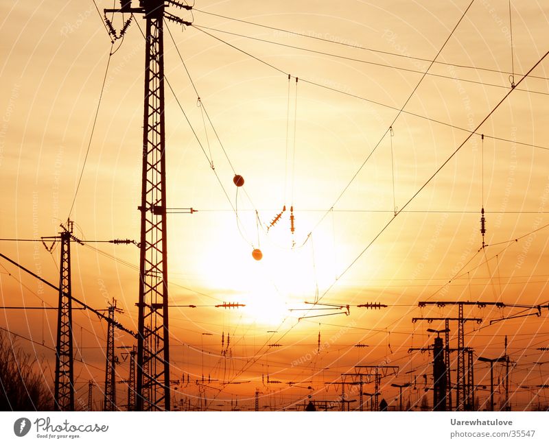 energy age Electricity Sunset Electricity pylon Red Yellow Environmental pollution Transport Energy industry Train station Cable Net smock