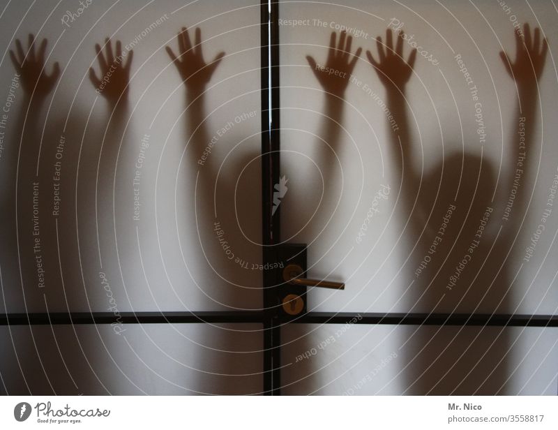 hands up Shadow Silhouette by hand Fingers Body door Glass door Frosted glass Window pane Creepy Transparent Shadow play Mysterious Hide Phantom Anonymous