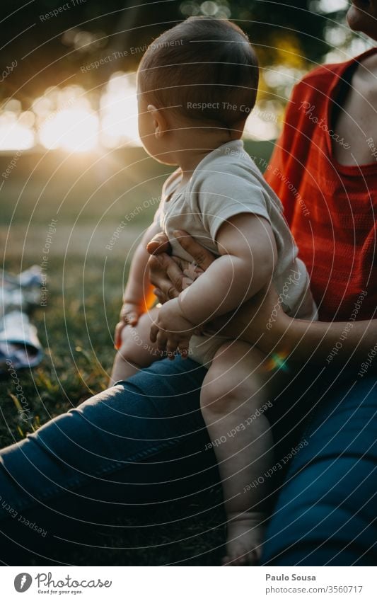 Baby with Mother looking at the sunset Sunset babyhood motherhood Looking Curiosity Innocent Child Cute Lifestyle Beautiful Infancy Caucasian Small Newborn Love