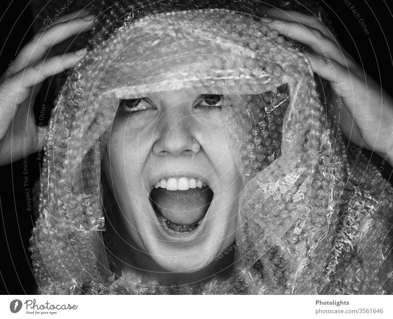 Hysterical, screaming woman Adults shrill with fear Head Plastic bag Cry for help White Black monochrome cry Woman Black & white photo Eyes 1 Human being Lips