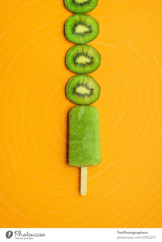 Kiwi ice cream popsicle. Green ice cream with kiwi slices 1 above view delicious dessert detox diet duotone flat lay flavor food freeze frozen fruits