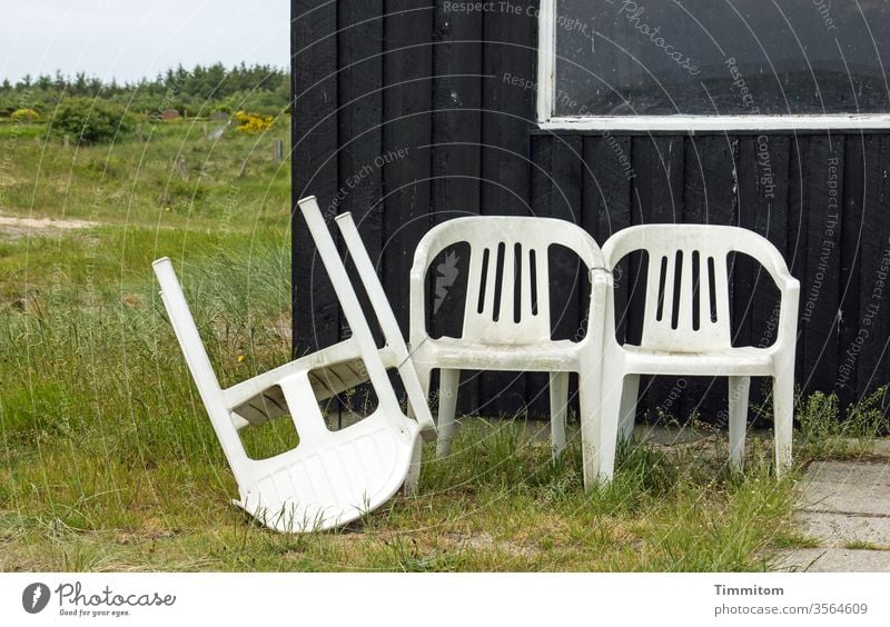 Discontent over seating chairs Seating Plastic three bowled over House (Residential Structure) hut Window wood Interconnected String Grass Deserted Colour photo
