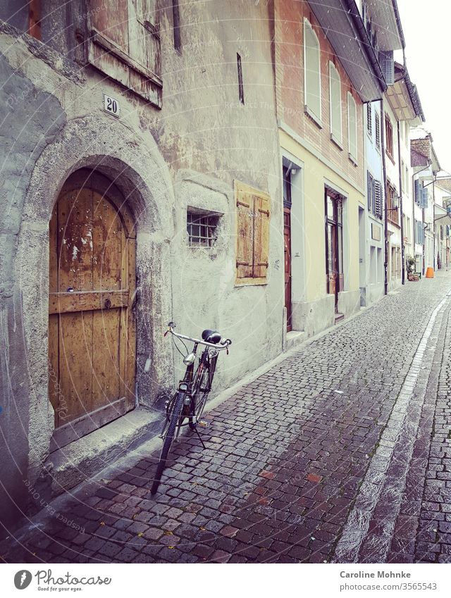 Alley in Solothurn Switzerland by bike Bike Bicycle Swiss Exterior shot Colour photo Deserted Summer Landscape Tourism Vacation & Travel Europe Sky Old Moody