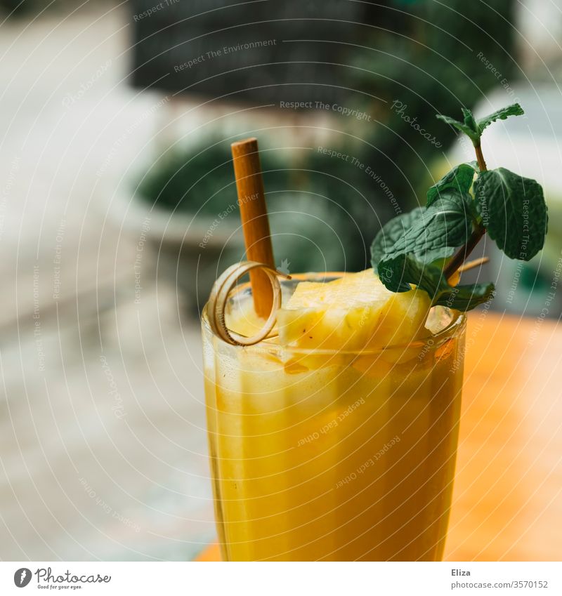 Healthy fresh pineapple juice smoothie with fresh mint Juice salubriously Pineapple Mango Yellow Delicious Pineapple juice Mint Fresh Pressed Glass straw out