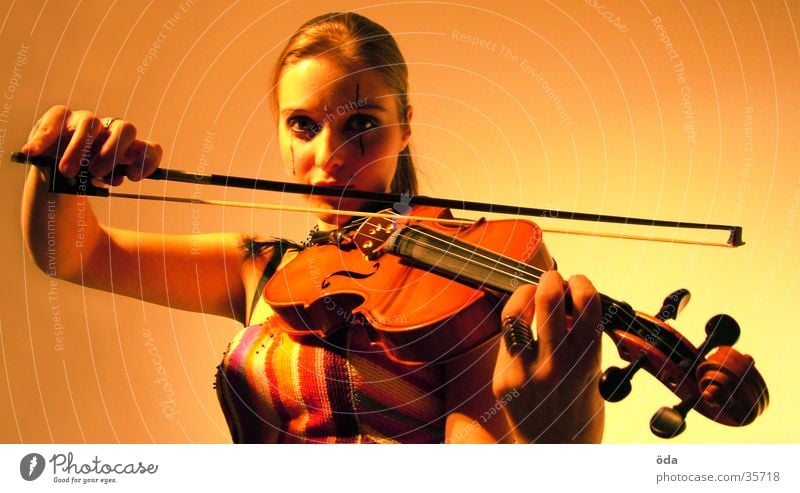 Violin #1 Woman Playing Musical instrument string Jewellery Necklace Wearing makeup Make-up Posture Arch Looking