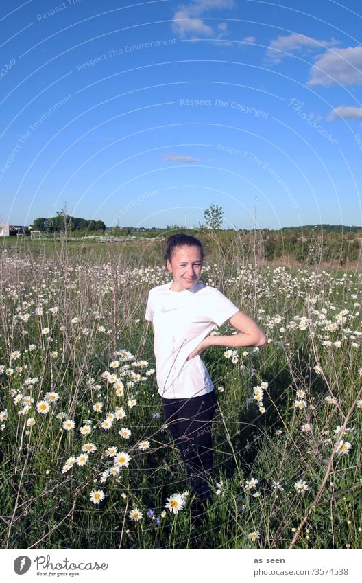 Girl in a daisy field girl Field flowers marguerites Marguerite White Blue Sky Beautiful weather Nature Plant Summer green Meadow Environment Day spring