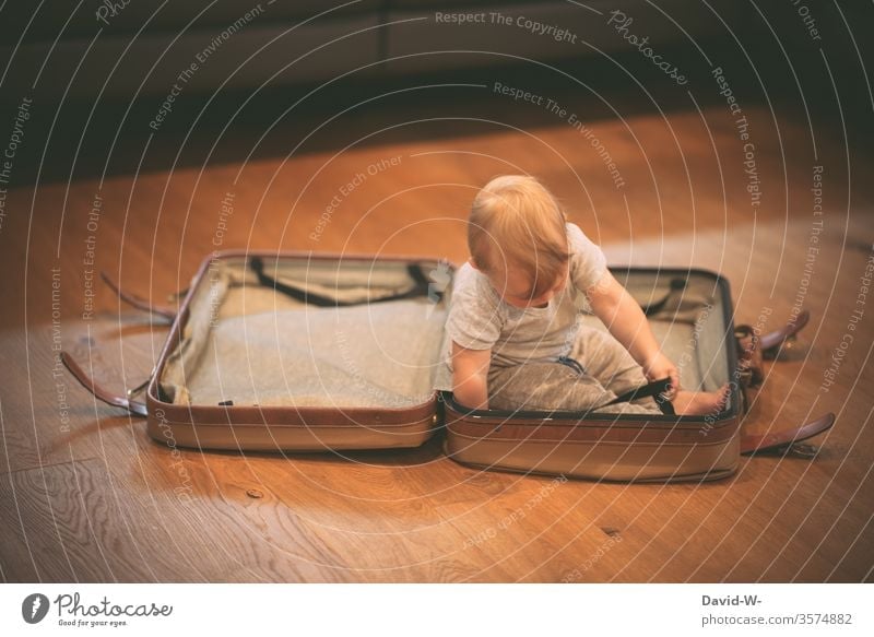 old | the suitcase - young | the contents Child Toddler Suitcase go away travel voyage vacation Preparation planning Vacation mood ready for a holiday