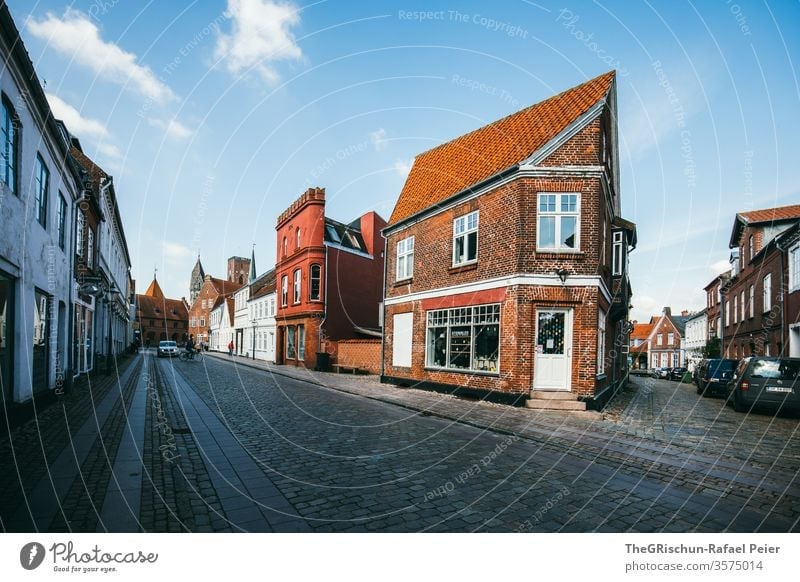 Corner house on a street House (Residential Structure) house cell Ribe Denmark Clouds Sky Exterior shot Blue Vacation & Travel Tourism Street Paving stone