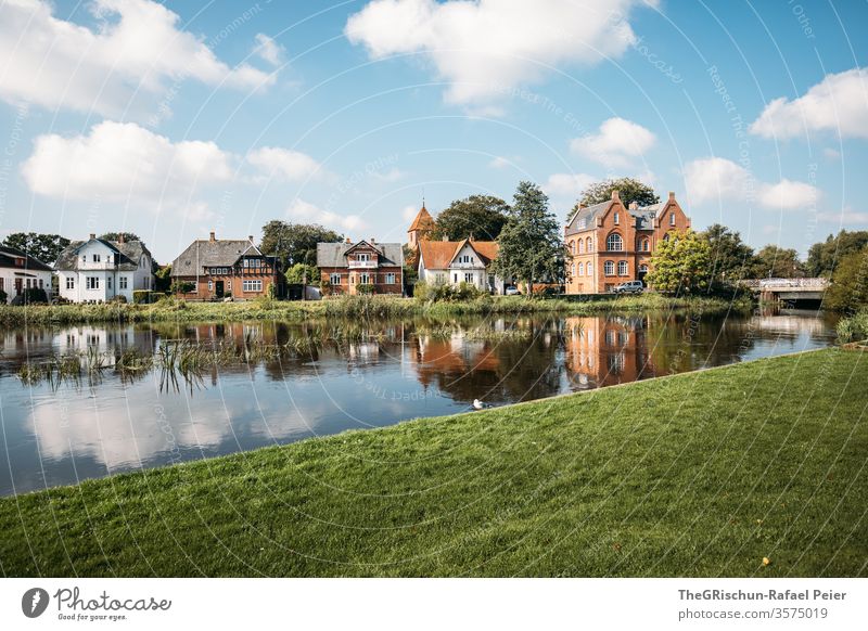 Beautiful houses on the river House (Residential Structure) house cell Ribe Denmark Meadow River Water Clouds Sky reflection Exterior shot Blue