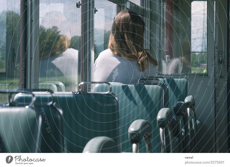 Woman in old train car indoors weigh Chair Movement travel Railroad Trip Interior moving Vehicle Transport Public Window Train Seat inward voyage Comfortable