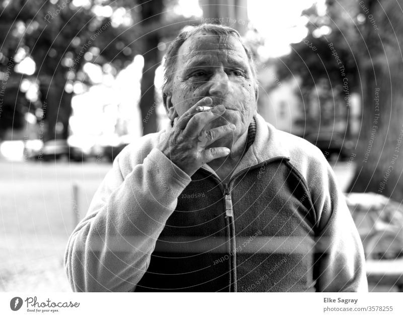 Senior smoking... Man Human being Cigarette Exterior shot Smoking Black and white
