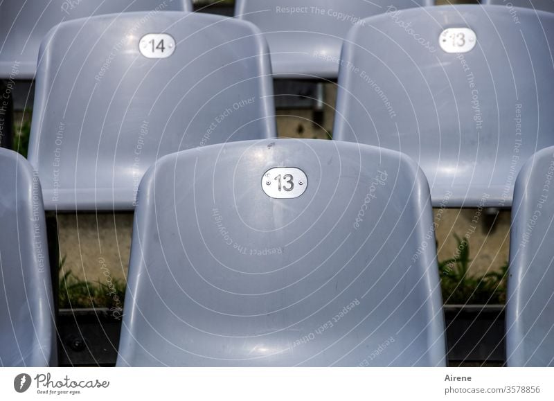 artistic grey area Theatre Empty chairs Seating capacity Audience interdiction performance Opera Concert Free series Chair rows Gray thirteen fourteen 13 14