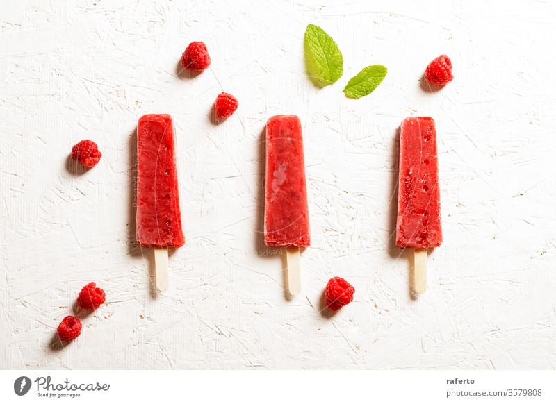 Delicious strawberry popsicles on white background ice cream pole dessert food sweet cold block glace stick fresh healthy snack top cool eat icy colours view