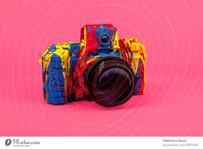 Colorful photo camera on bright background color colorful photography creative retro art design paint inspiration concept style hobby memory vivid vibrant