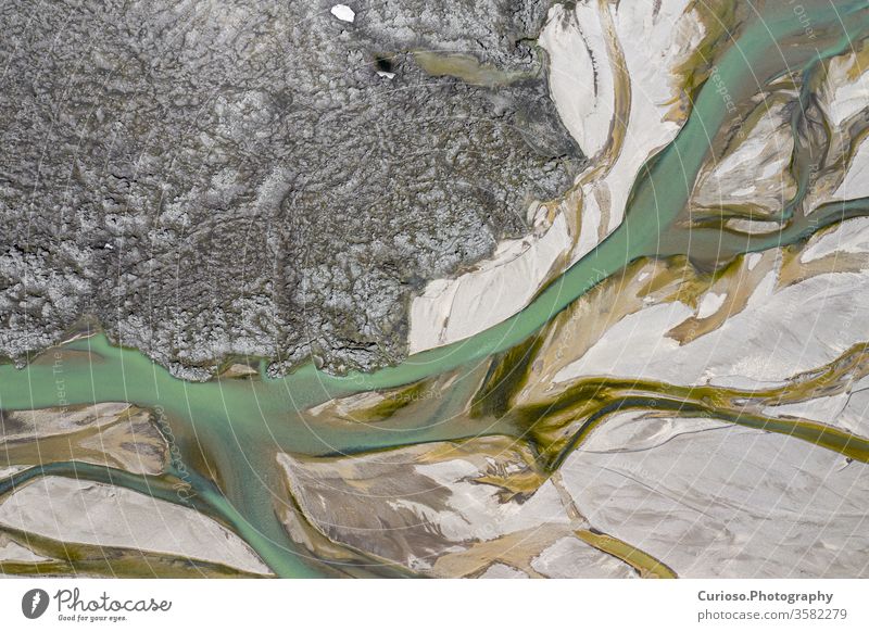 Landmannalaugar National Park - Iceland. Rainbow Mountains. Aerial view of amazing glacier river patterns. Top view. Picture made by drone from above. aerial